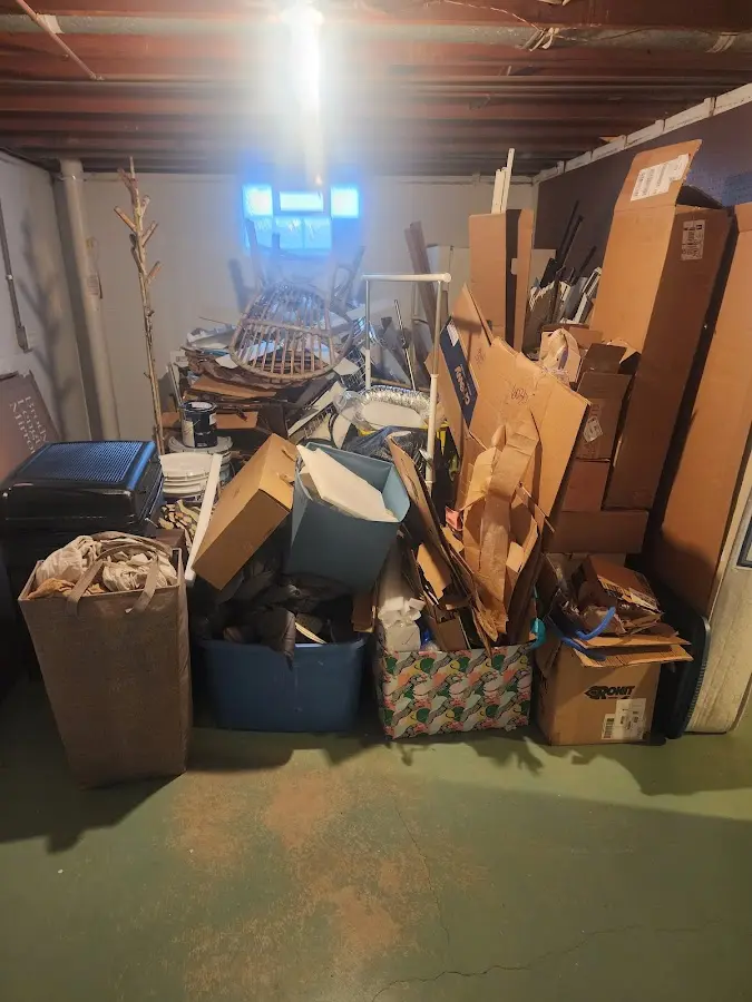 Roll-off dumpster container at job site for 2 Yard Dumpster Rental in Baldwin